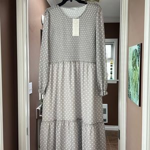 Grey midi length dress. Grey with polka dots.